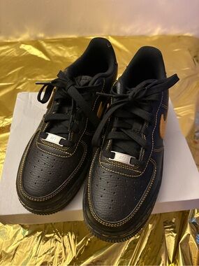 Nike Air Force One Sneakers with Gold Accent Details